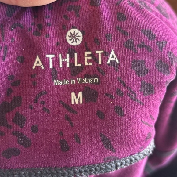 Athleta capris length women’s leggings size medium. Purple with black pattern. - Picture 5 of 10